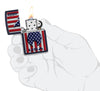 Zippo Patriotic Flame Design Navy Matte Windproof Lighter lit in hand.